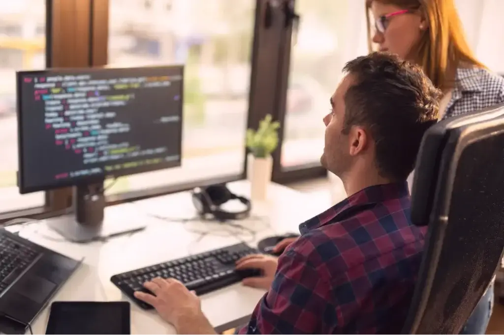 web design agency coder developing client website.